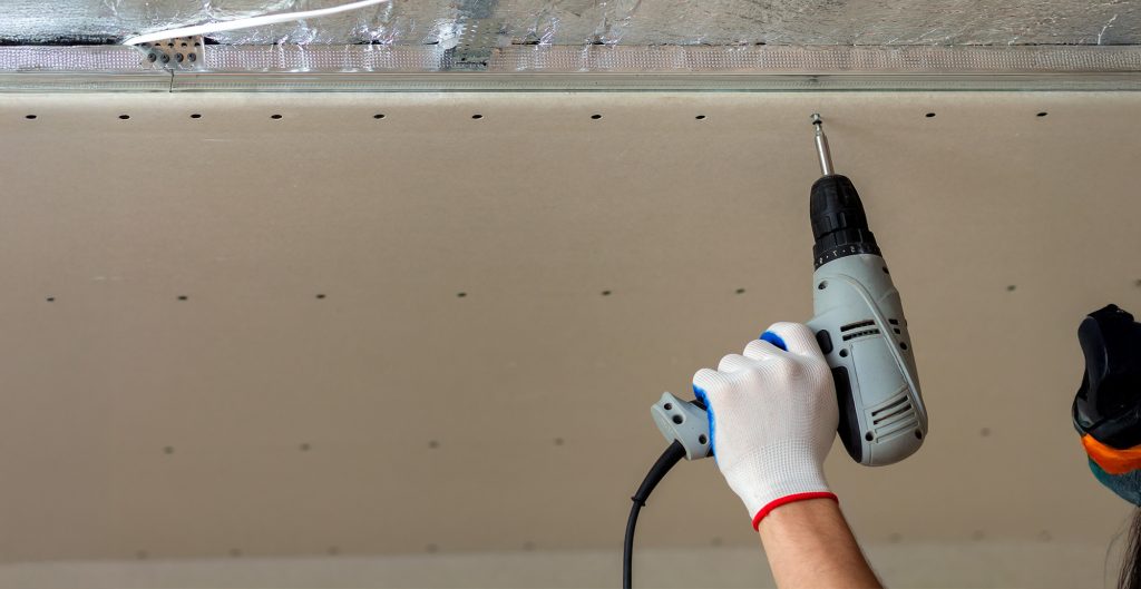 Securing drywall to ceiling